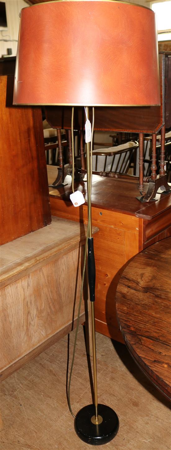 A stylish brass lamp standard